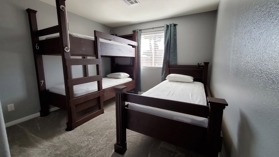 Bedroom with bunkbed and twin bed