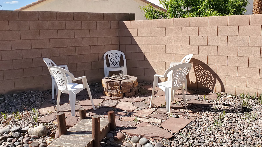 Firepit with chairs around it